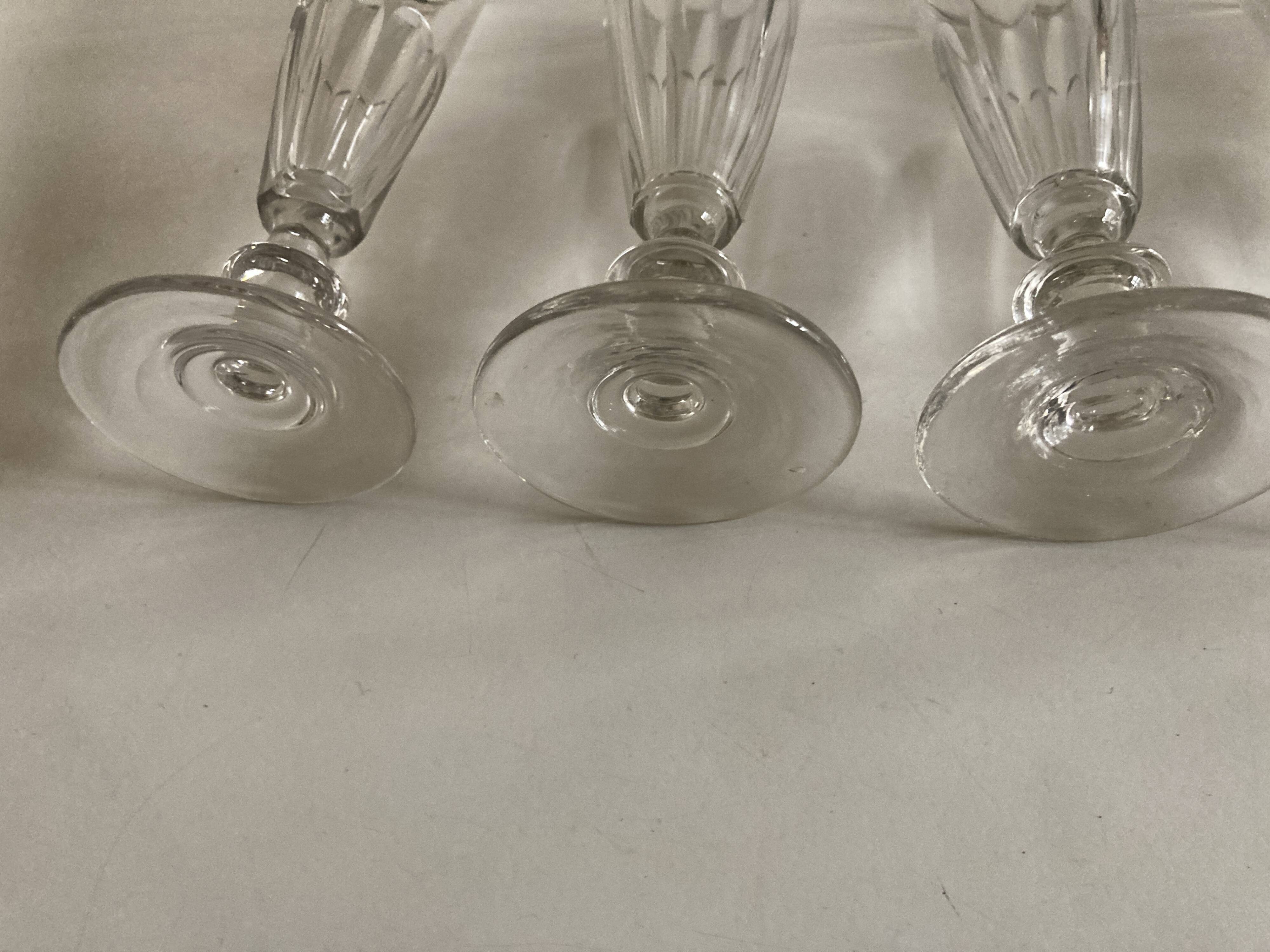 Set of 5 19th glass champagne flutes with flat slices cut
