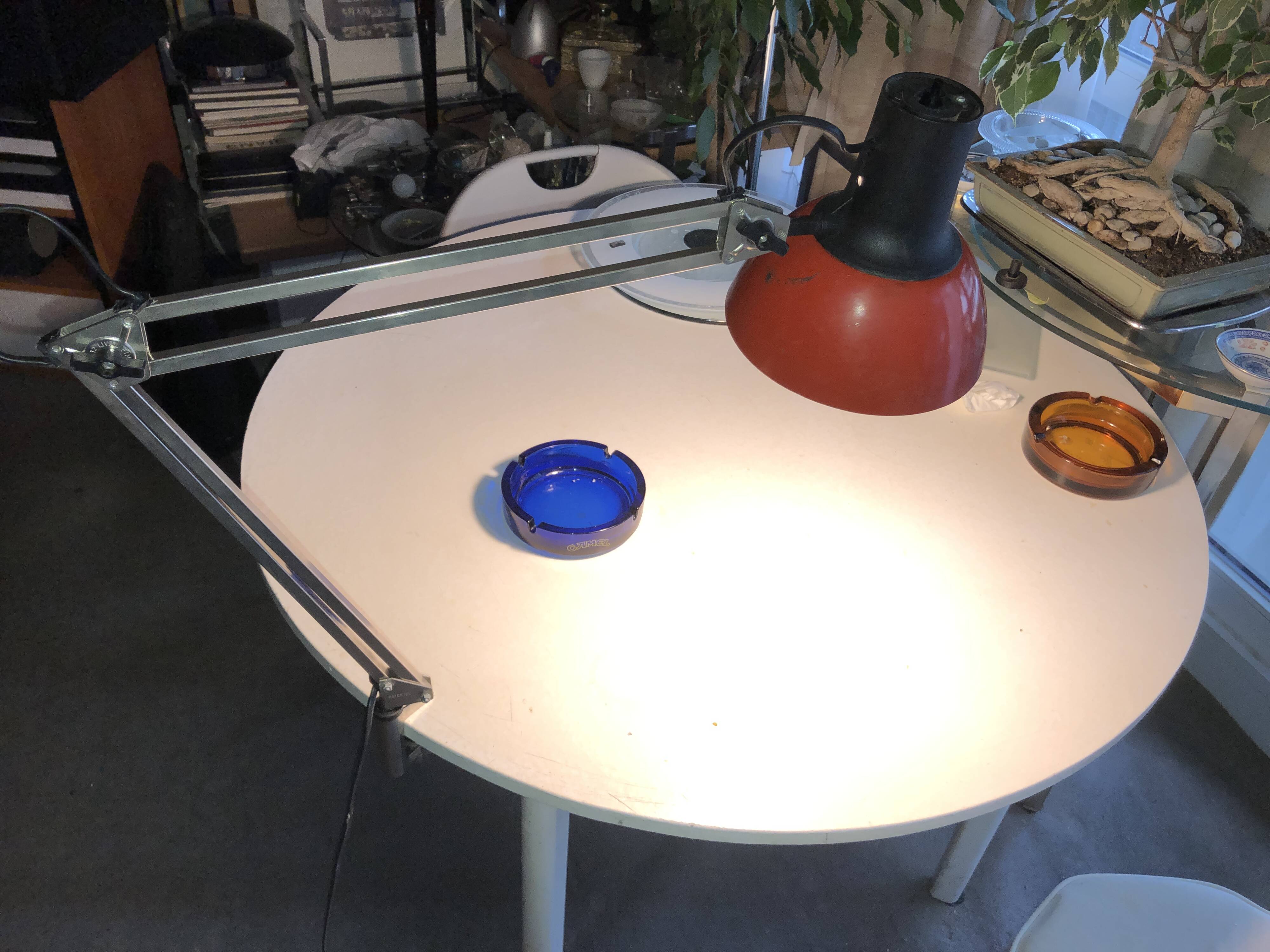 Red architect lamp patented Finland
