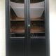 Showcase cabinet of curiosities black and wood