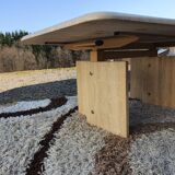 Adjustable travertine coffee table eye shape