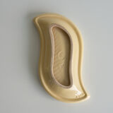 Beige and off-white ceramic ravier