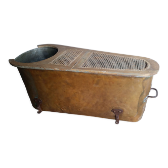 18th century copper bathtub with canned wooden top