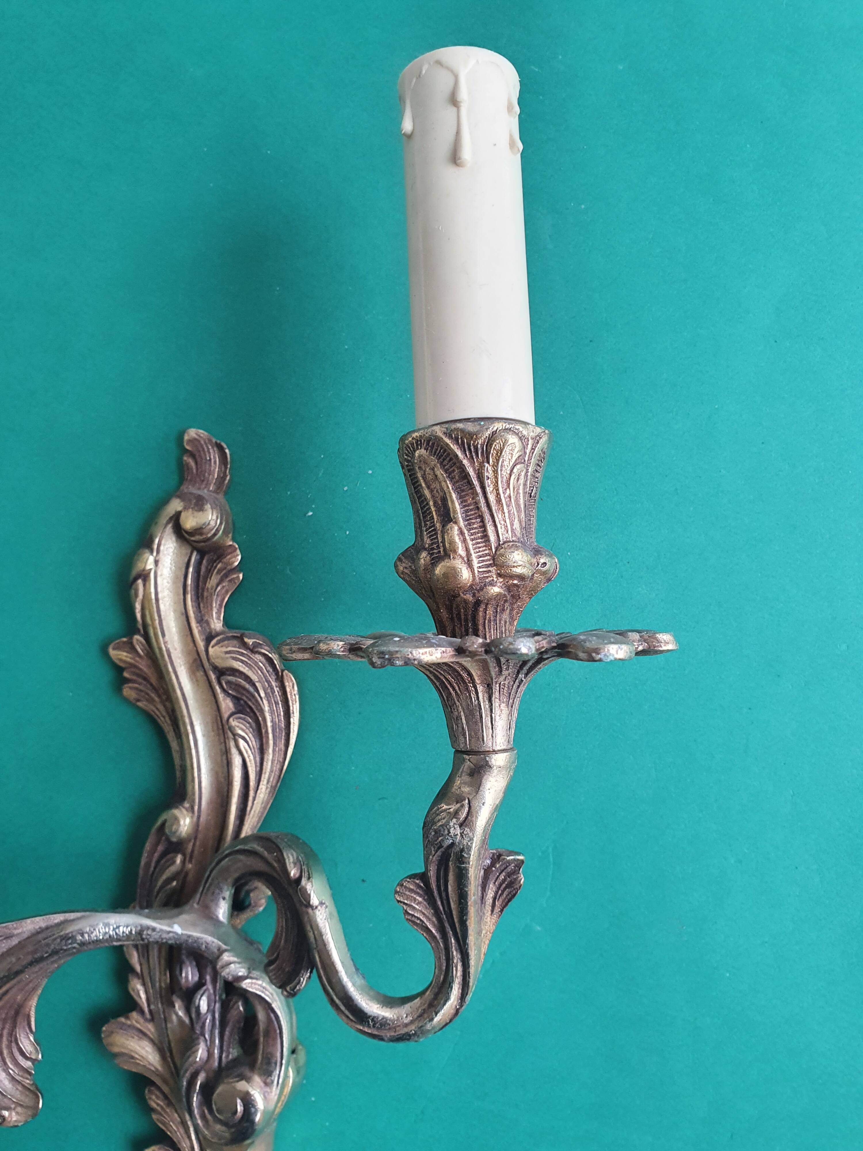 Pair of large antique candlestick wall sconces