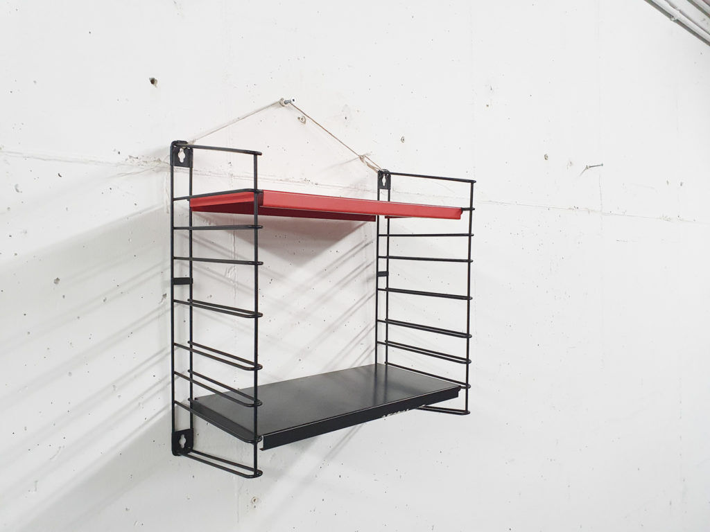 Red and black metal book shelves by Tomado, The Netherlands 1950's