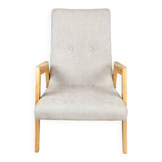 Fauteuil beige vintage années 1970