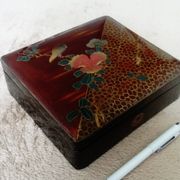 Old lacquered jewelry box with Asian decoration bird, flower, bee