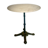 Bistro table with cast iron foot and marble tray