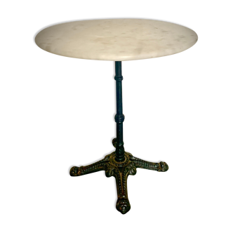 Bistro table with cast iron foot and marble tray