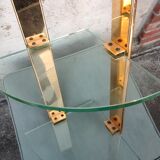 Wall shelf in gilded metal and glass/1980s