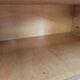 Pair of 1950s maple nightstands with mirrored tops