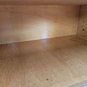 Pair of maple bedside tables from the 1950s with mirrored tops.