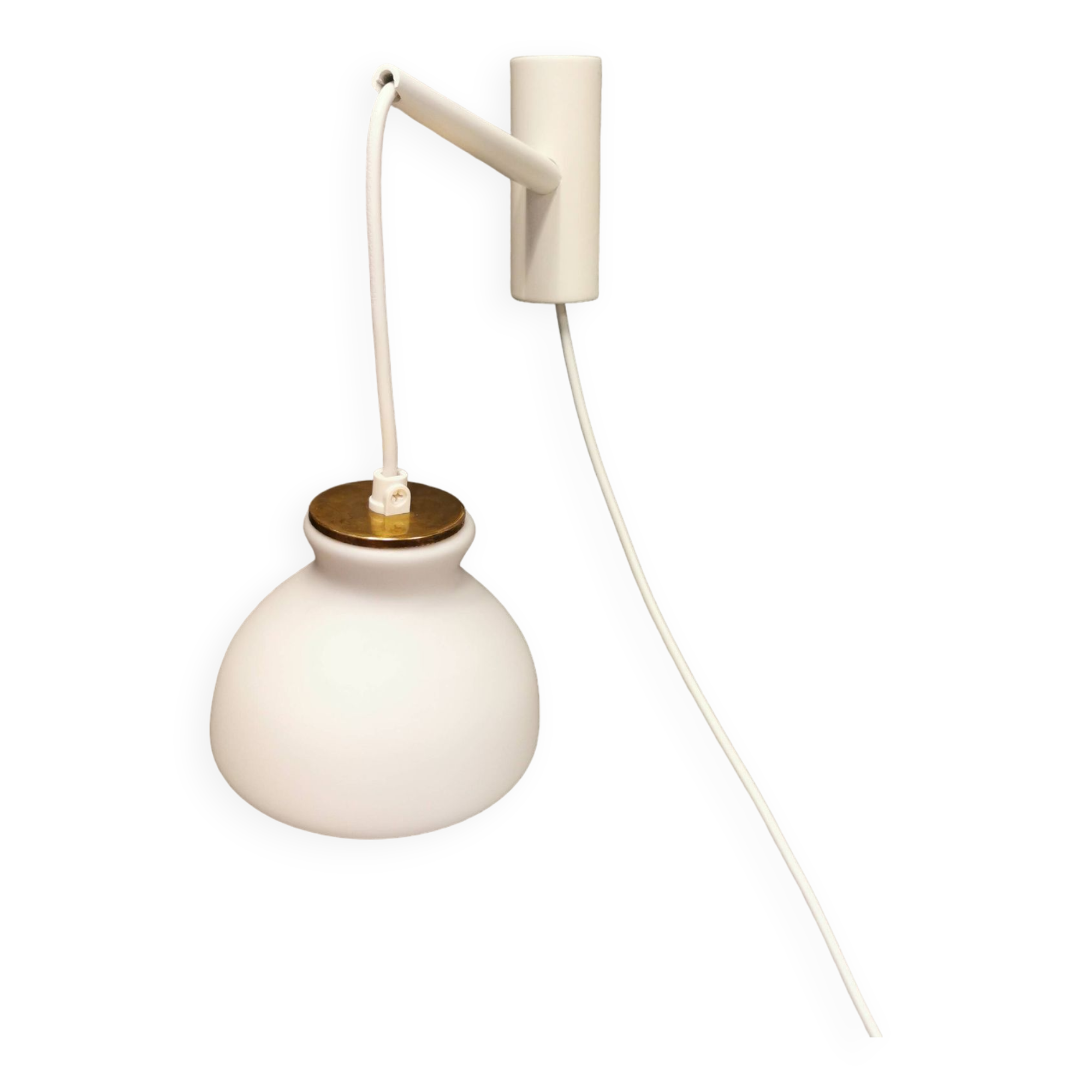 Milky white Holmegaard wall lamp with glass shade and a brass detail on top. Wooden wall bracket