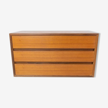 Wall mounted cabinet in teak of danish design from the 1960s.