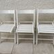 3 chaises pliantes en bois peint en blanc
