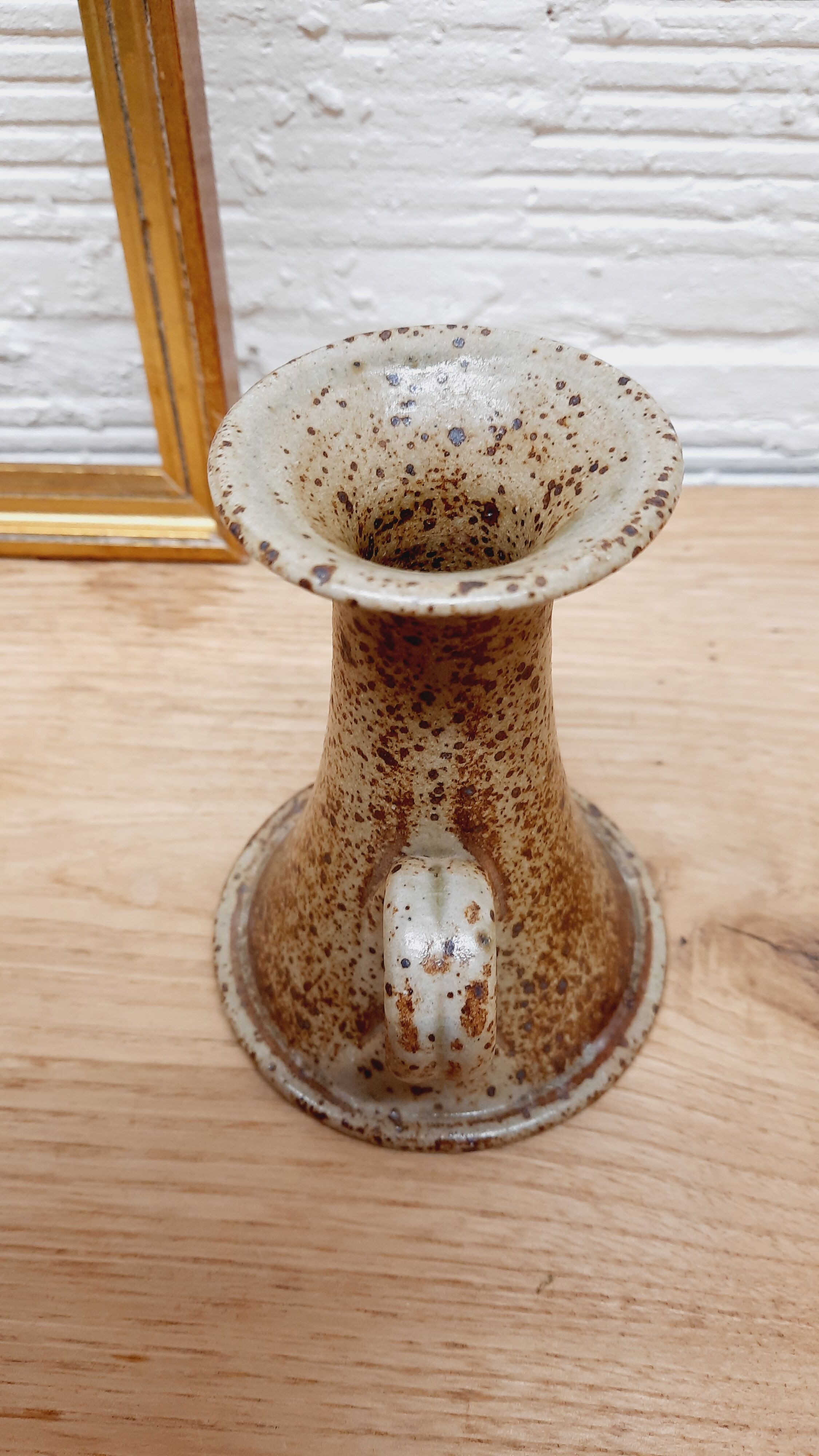 Hand candlestick sandstone