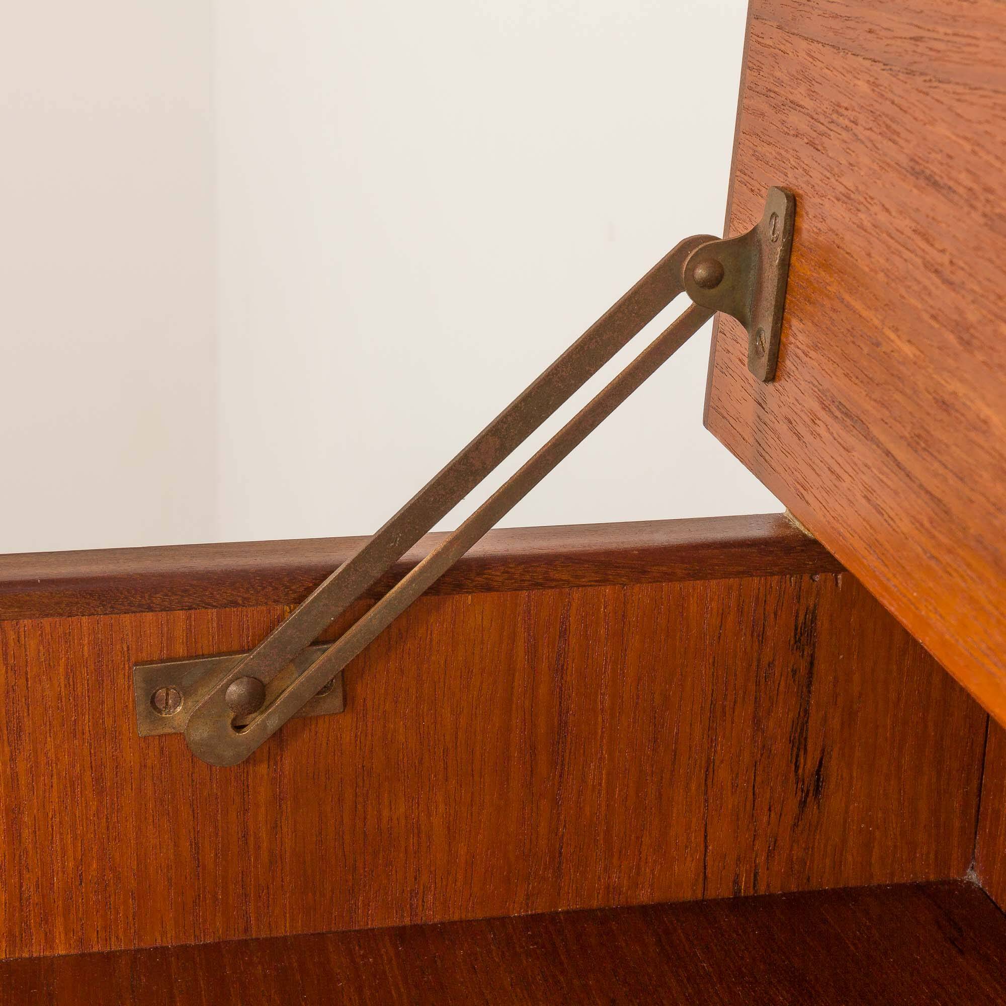 Danish mid century teak chest of drawers with hidden vanity, 1960s