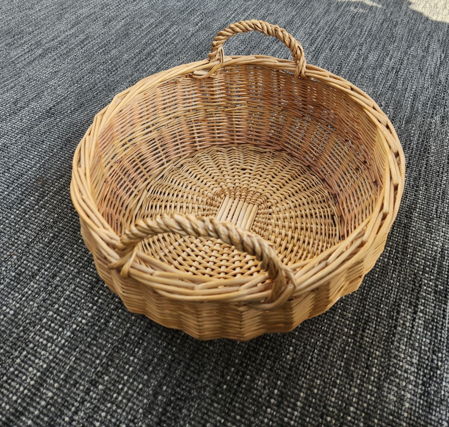 Large round wicker basket with handles