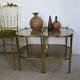 Paire de tables d’appoint en laiton et verre fumant des années 70