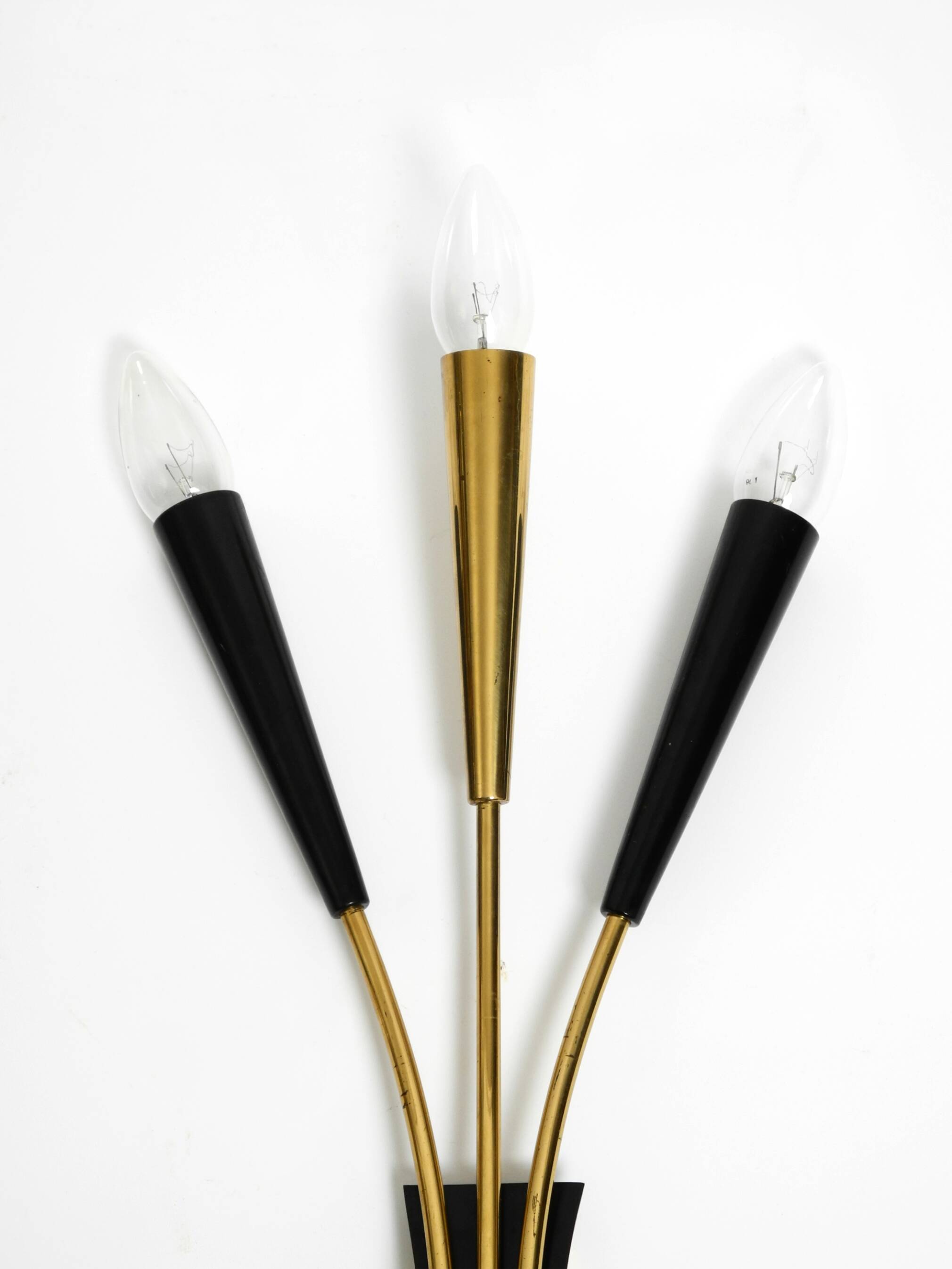 Two beautiful large Mid Century Modern brass 3-light cone wall lamps