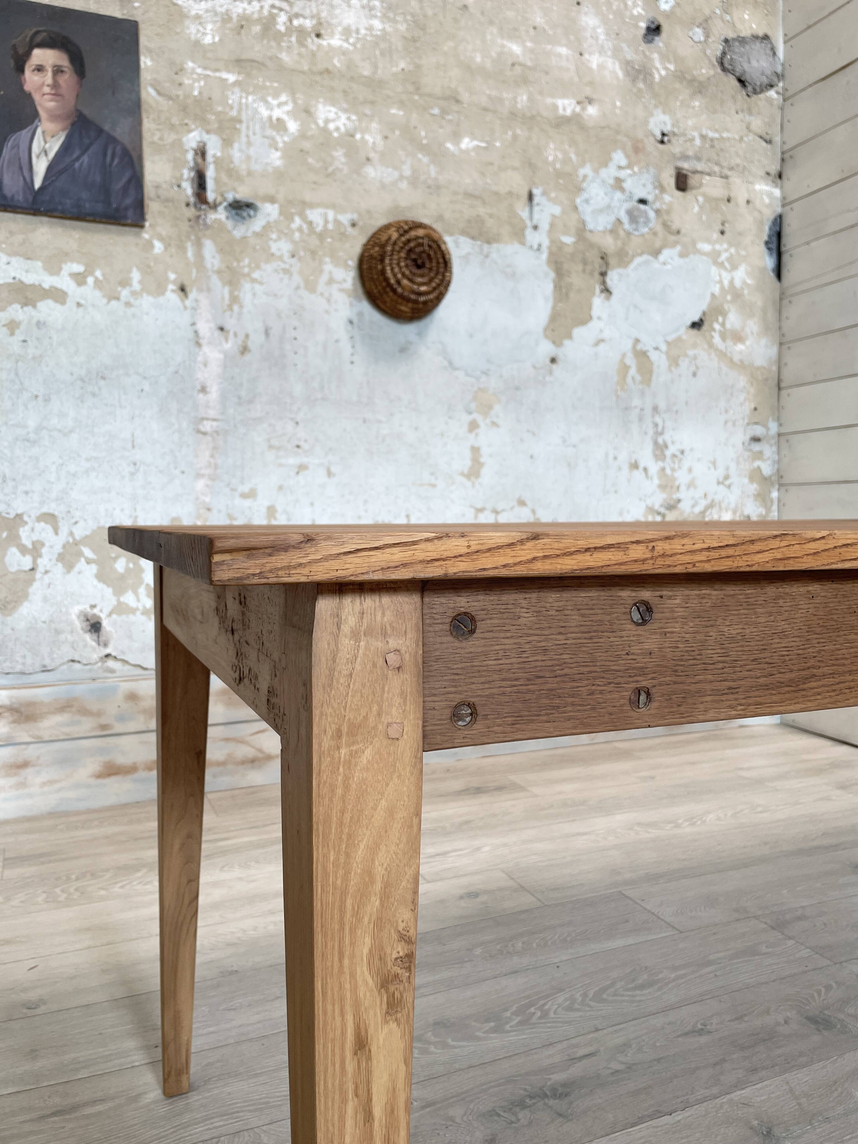 Vintage farm table with spindle legs.