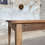 Vintage farm table with spindle legs.