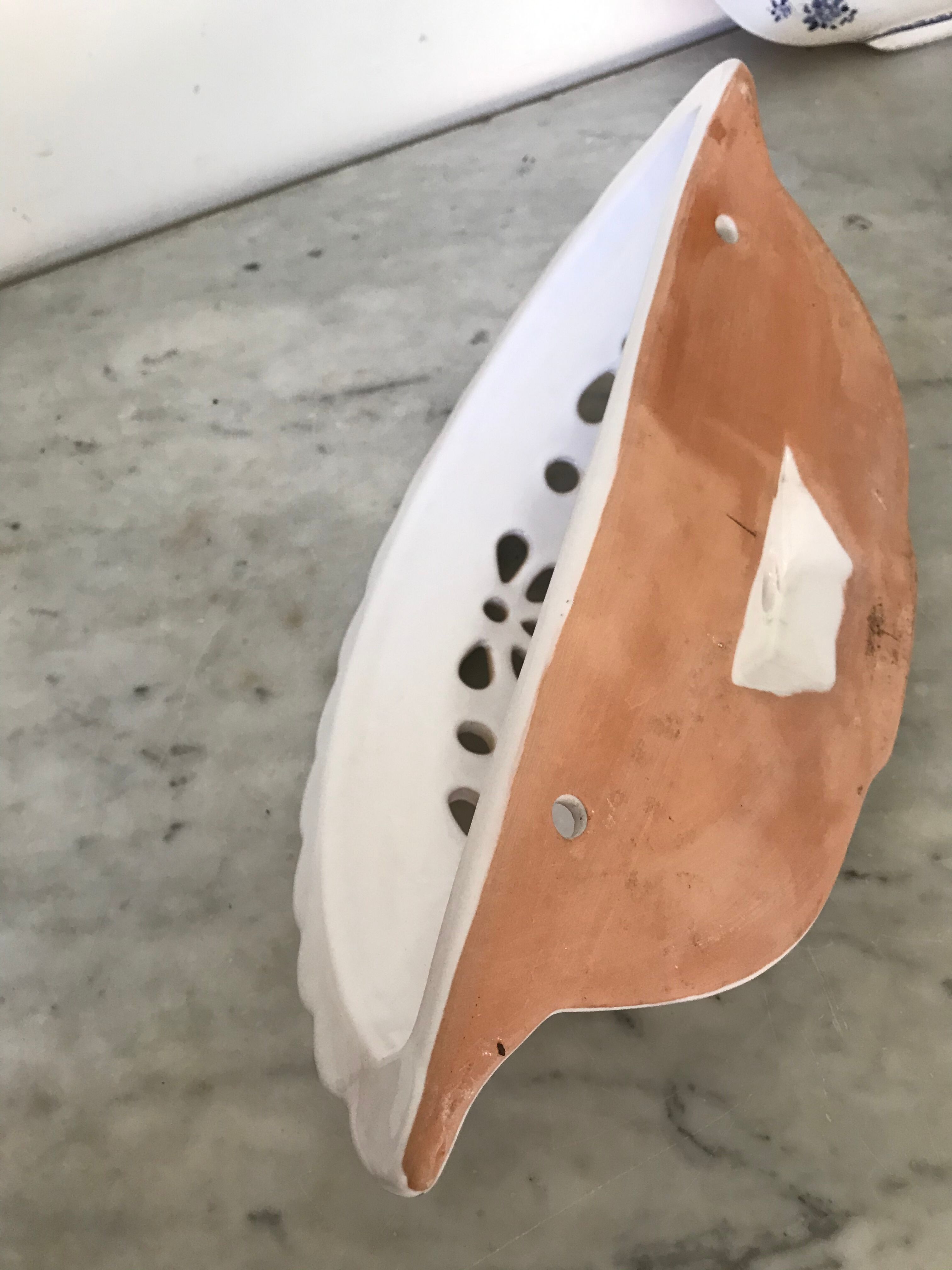 Pair of ceramic moustiers sconces