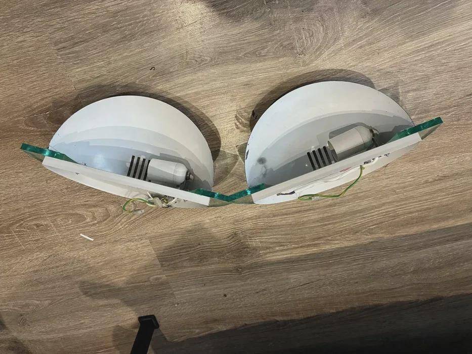 Pair of Bahag wall lights, chrome half-spheres on curved glass, 1980s