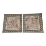 Antique tapestries framed in repoussé brass.