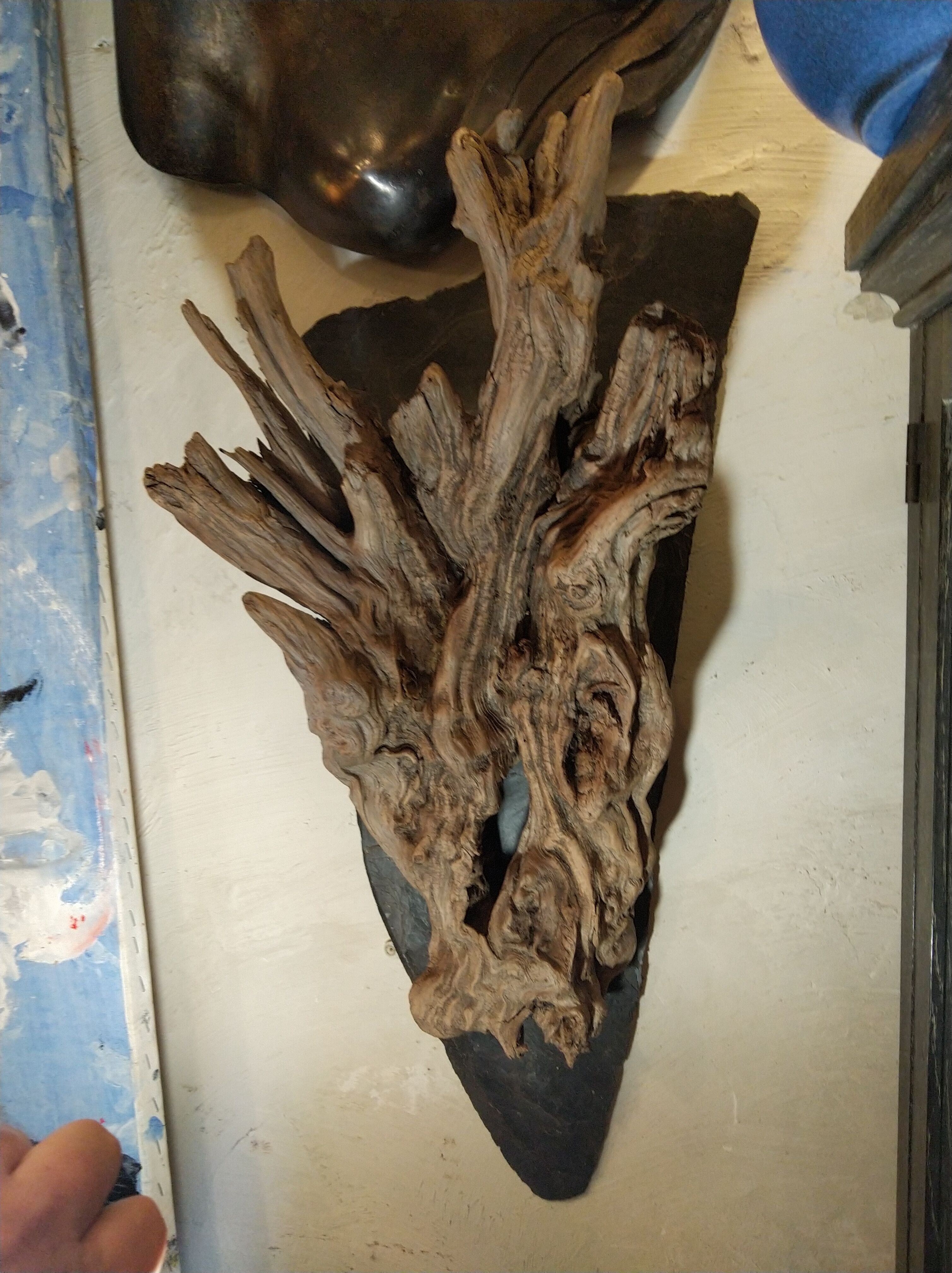 Natural wood sculptural coat rack