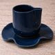 Set of wavy ceramic cup and saucer - petrol blue