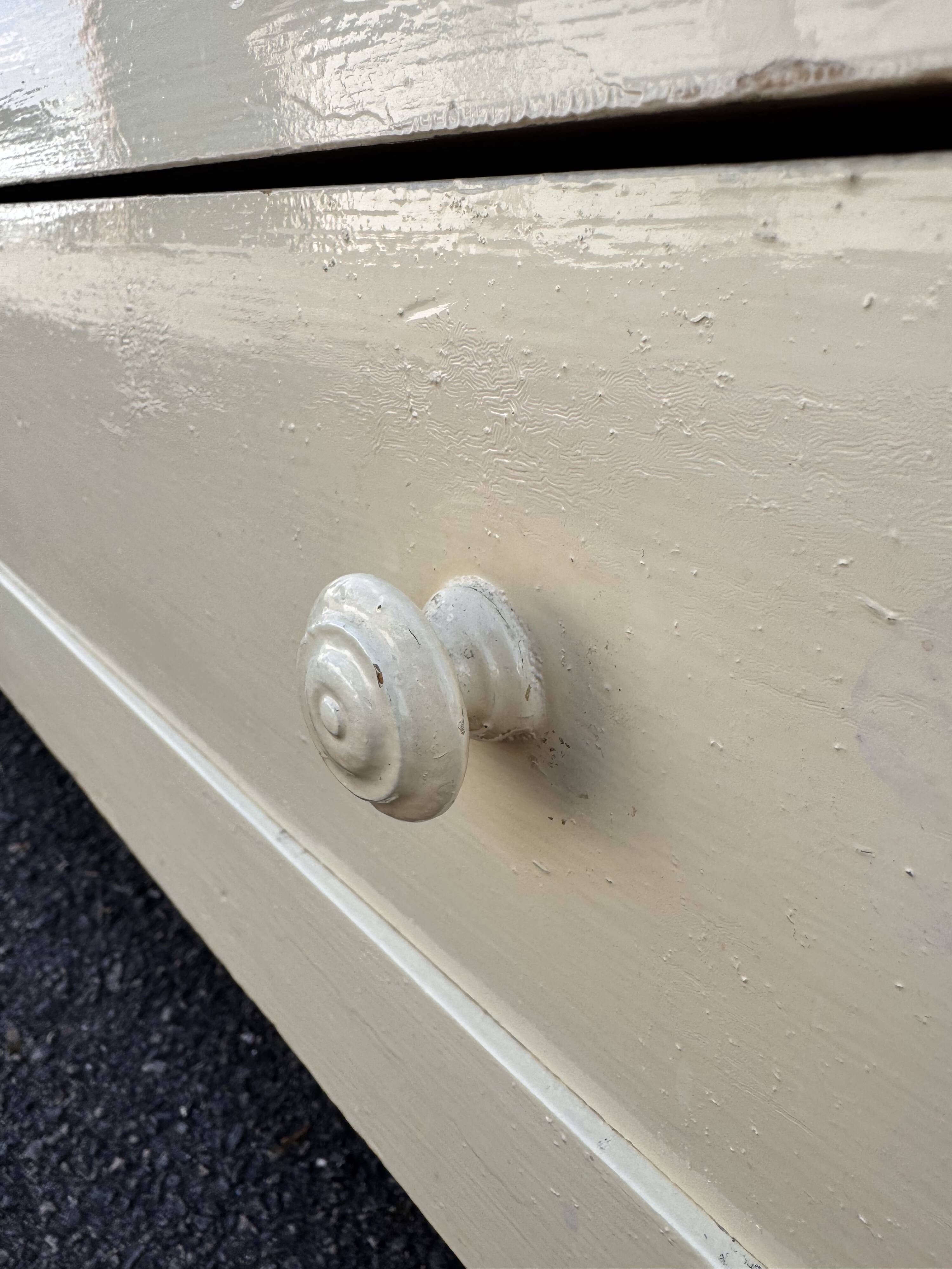 Antique painted wooden bonnet maker