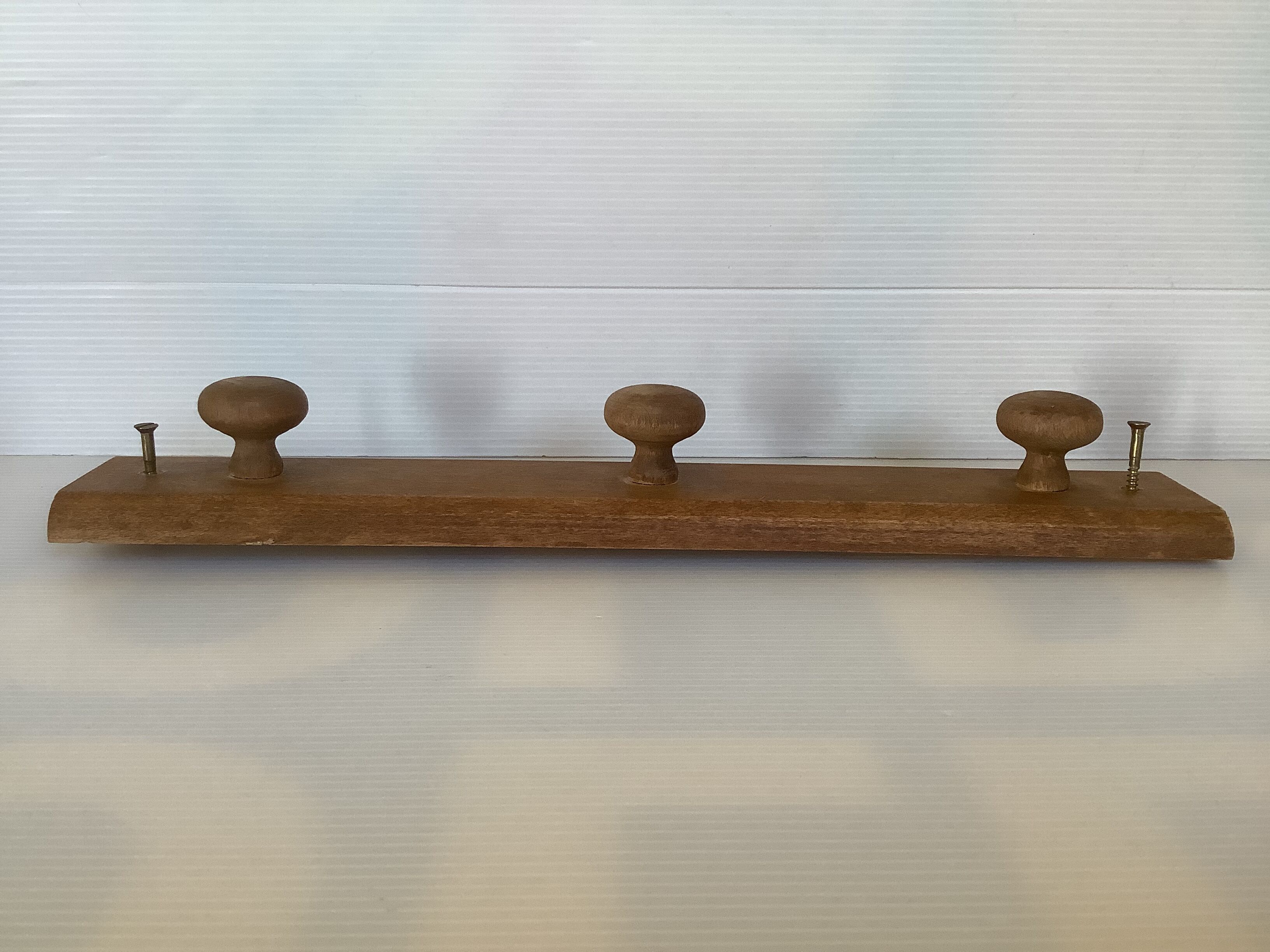 Wooden wall coat rack