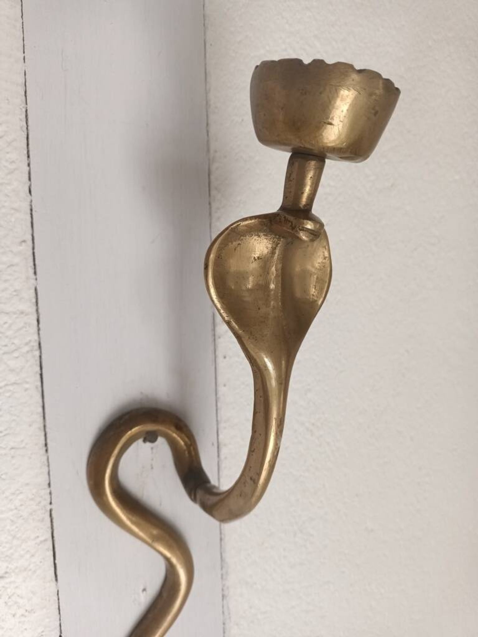 Bronze cobra candle holder wall sconce