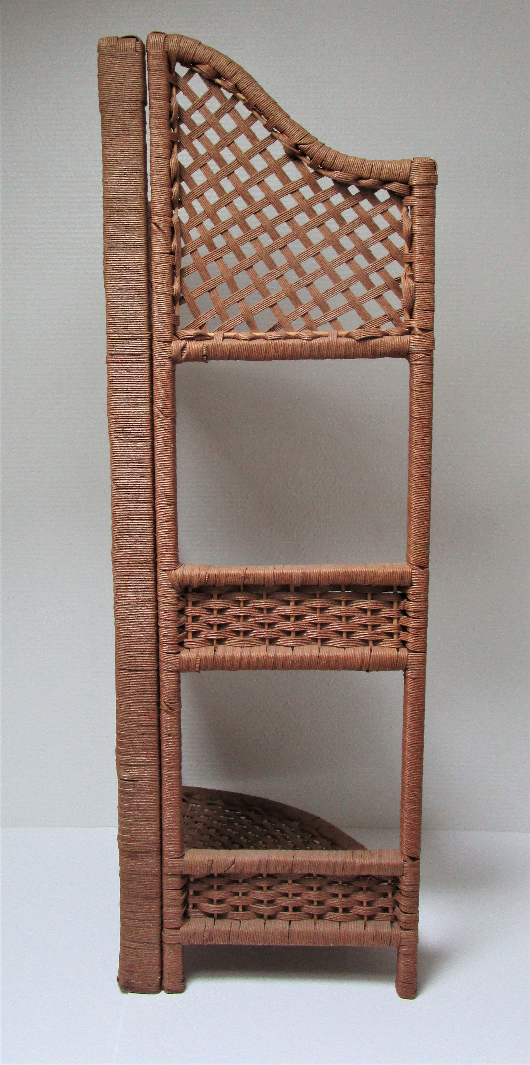Corner shelf made of vintage braided natural fibers