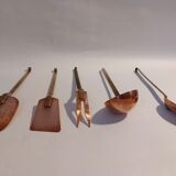 Old gilded brass and copper kitchen utensils