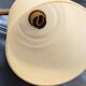 Wall light with opaline glass