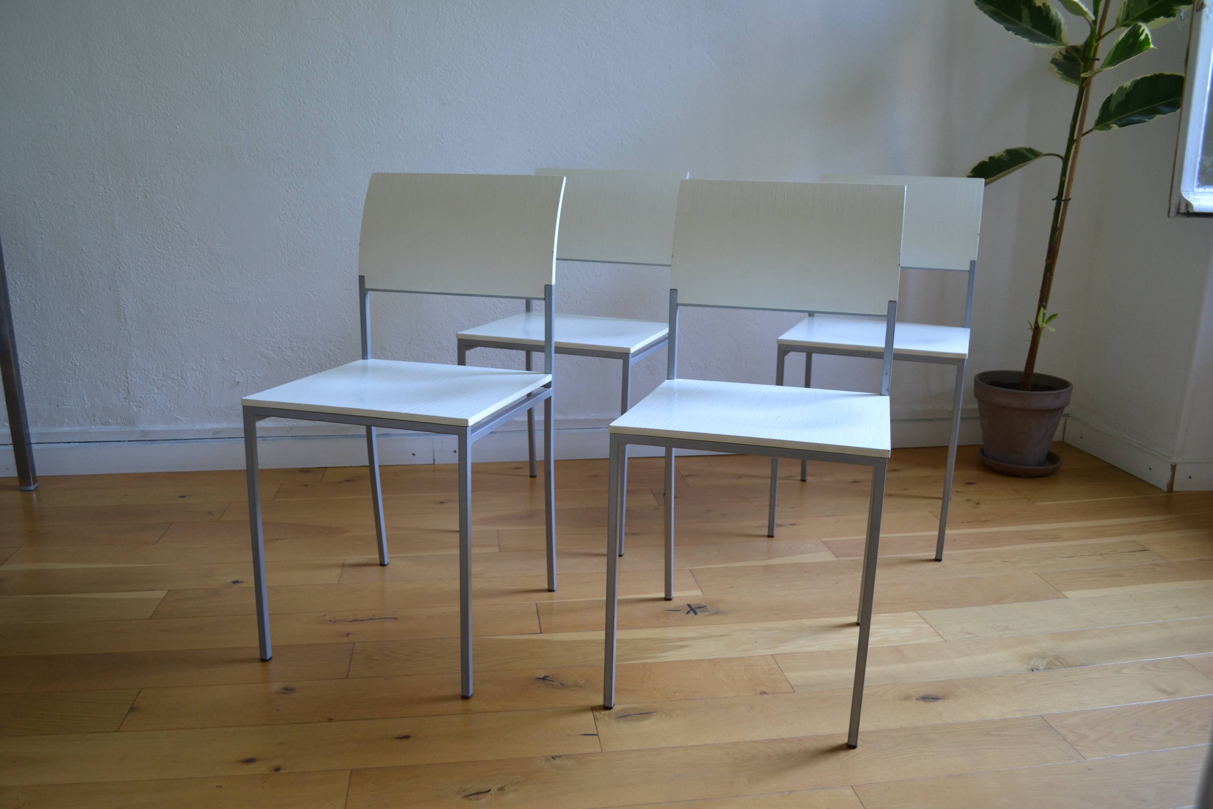 Set of 4 vintage metal and wood chairs from the 1990s.