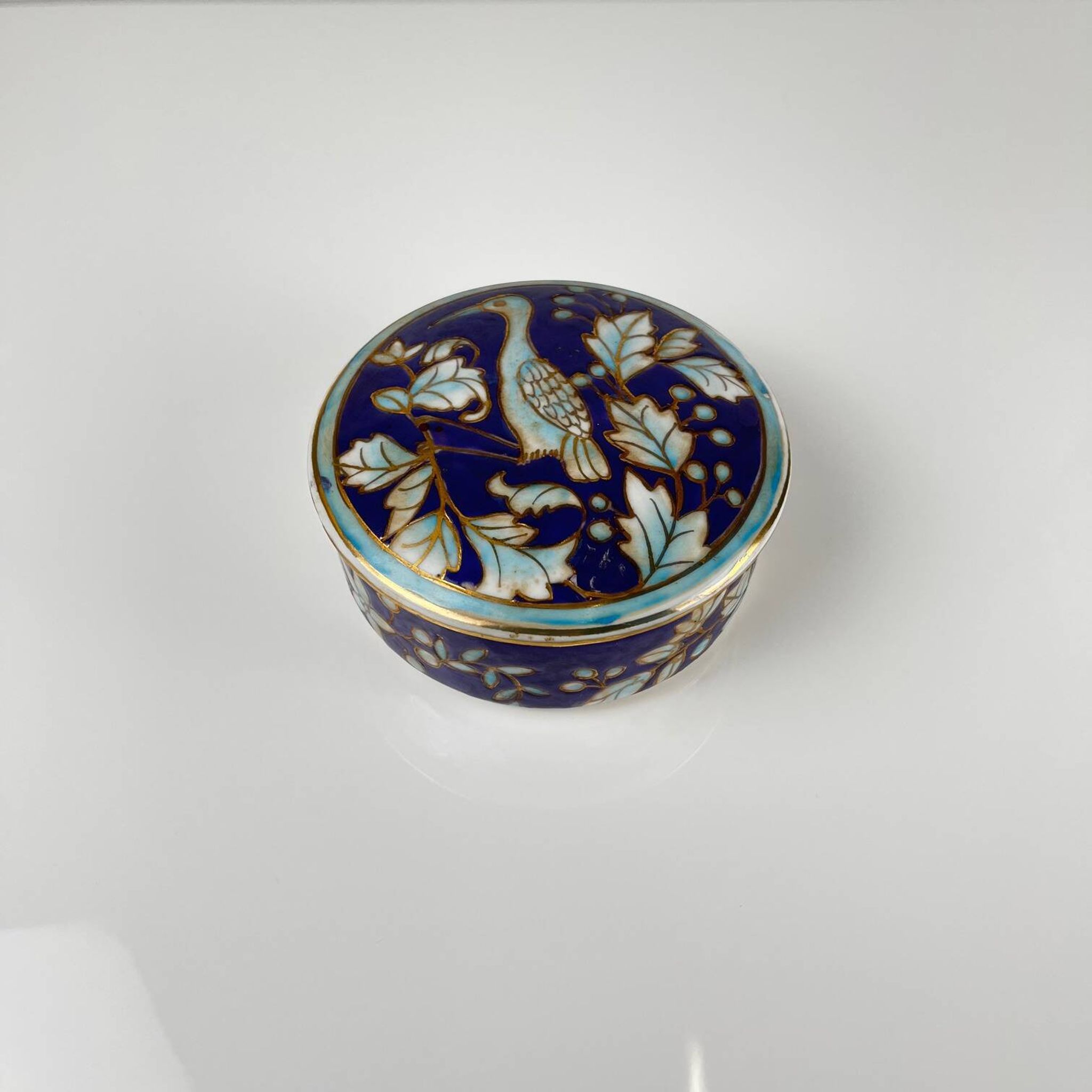 Chinese blue porcelain box with bird and flower motif