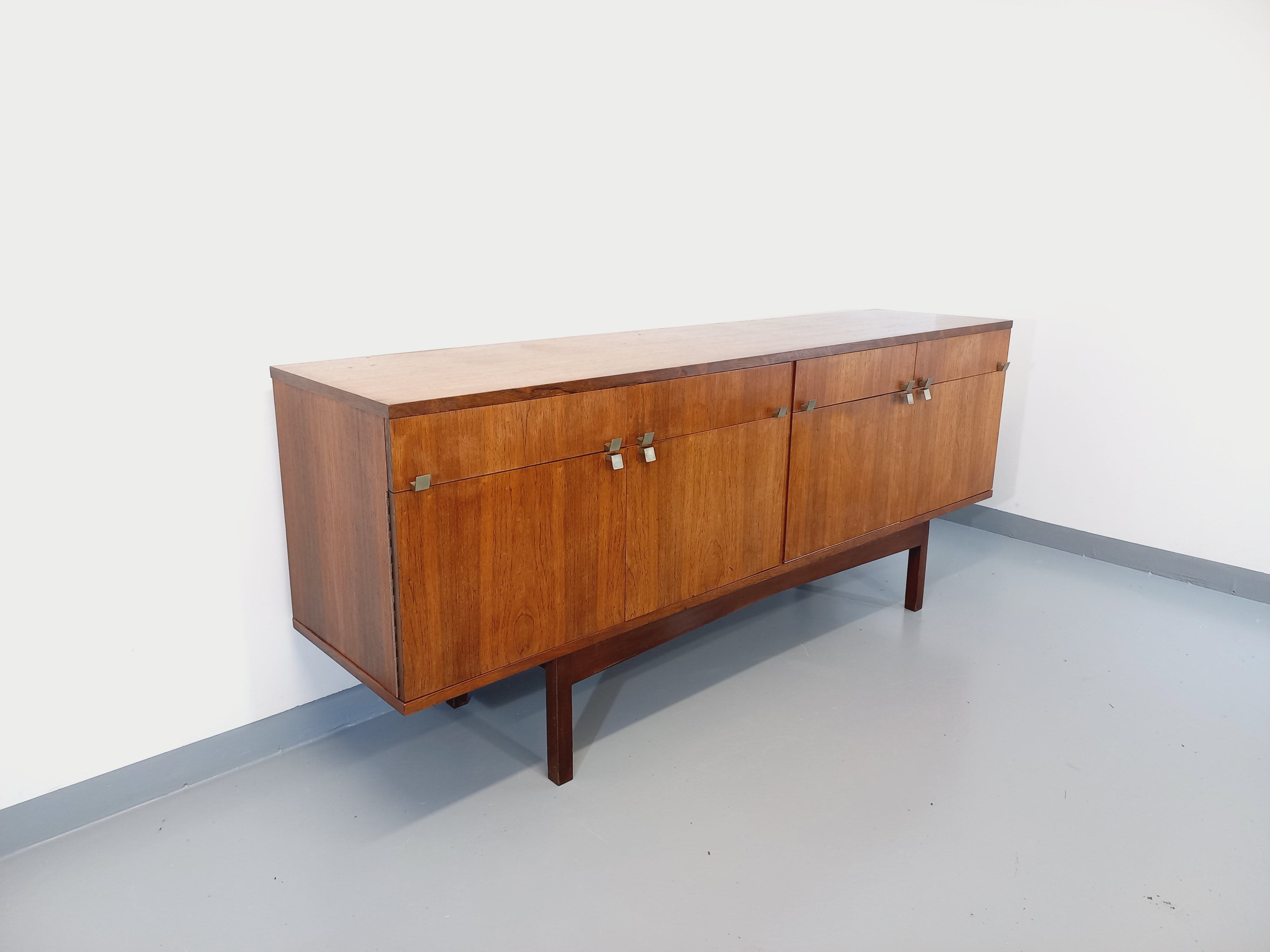Vintage Scandinavian style row in rosewood and brass from the 60s