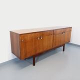 Vintage Scandinavian style row in rosewood and brass from the 60s