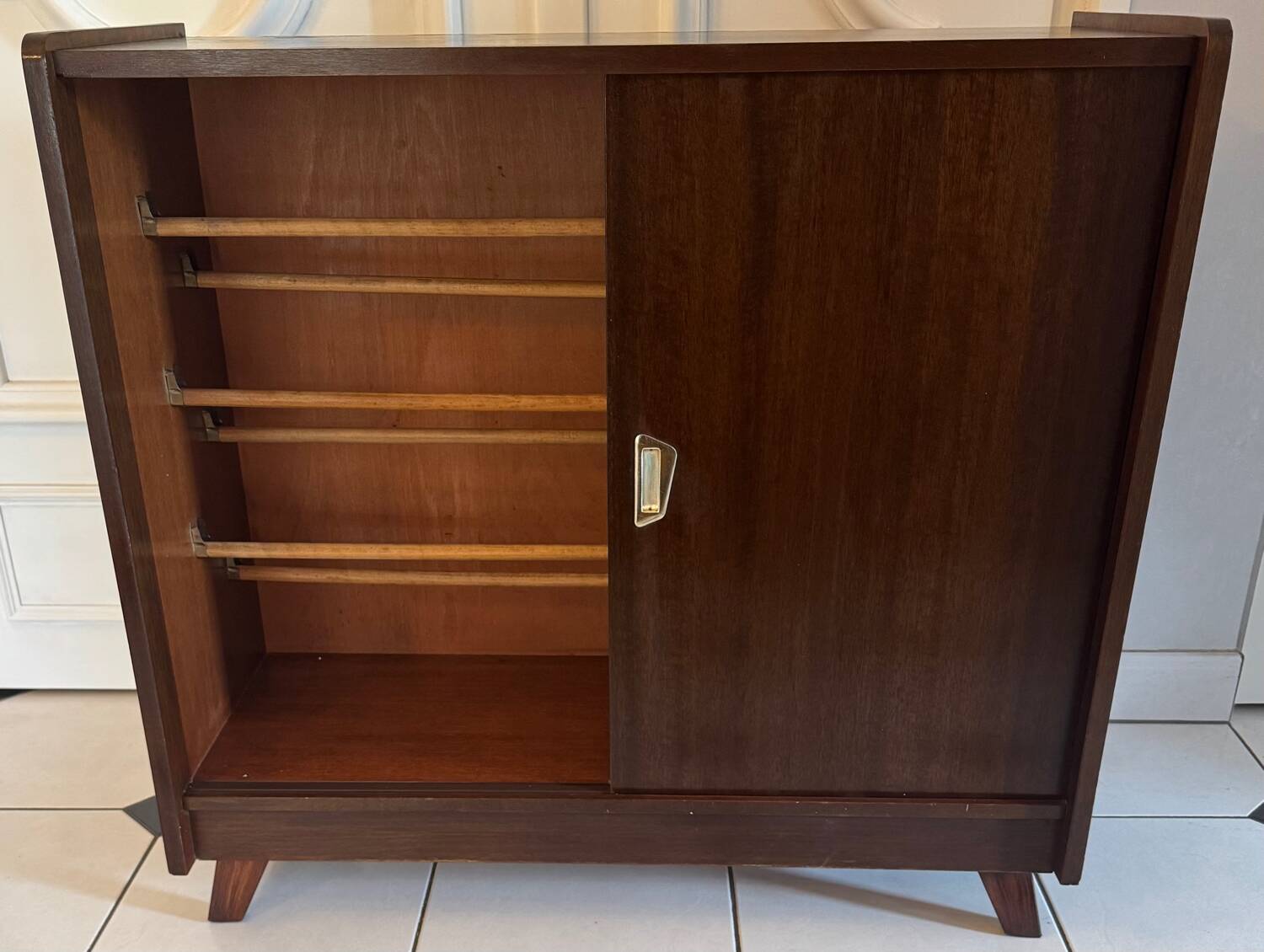 Vintage shoe cabinet with compass legs