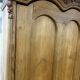 Large country pine bonnetière with carved details.