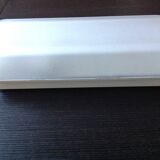 Rectangular porthole wall light in industrial/70s style frosted glass