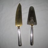 silver metal knife and cake shovel