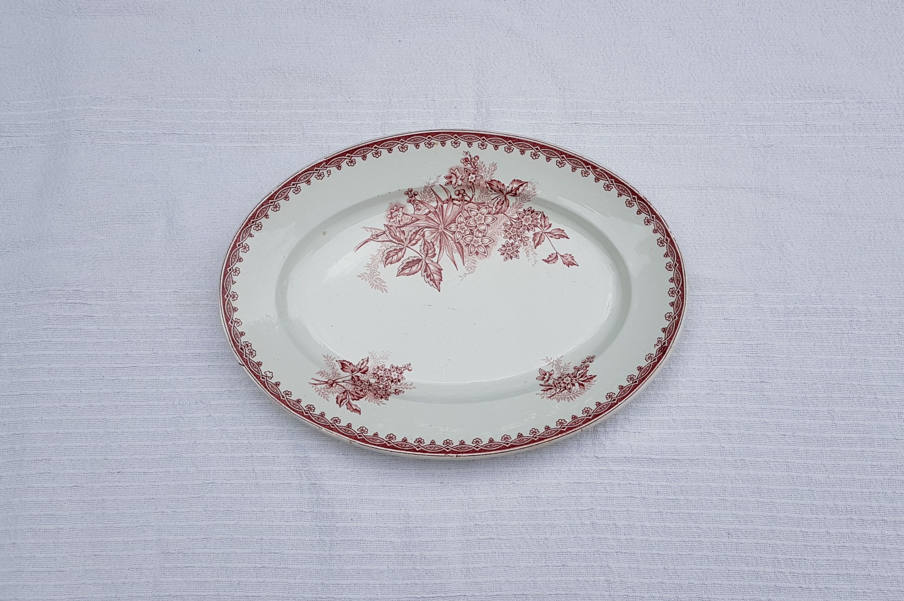 Oval serving dish in earthenware of Sté Amandinoise model Margot, iron earth.