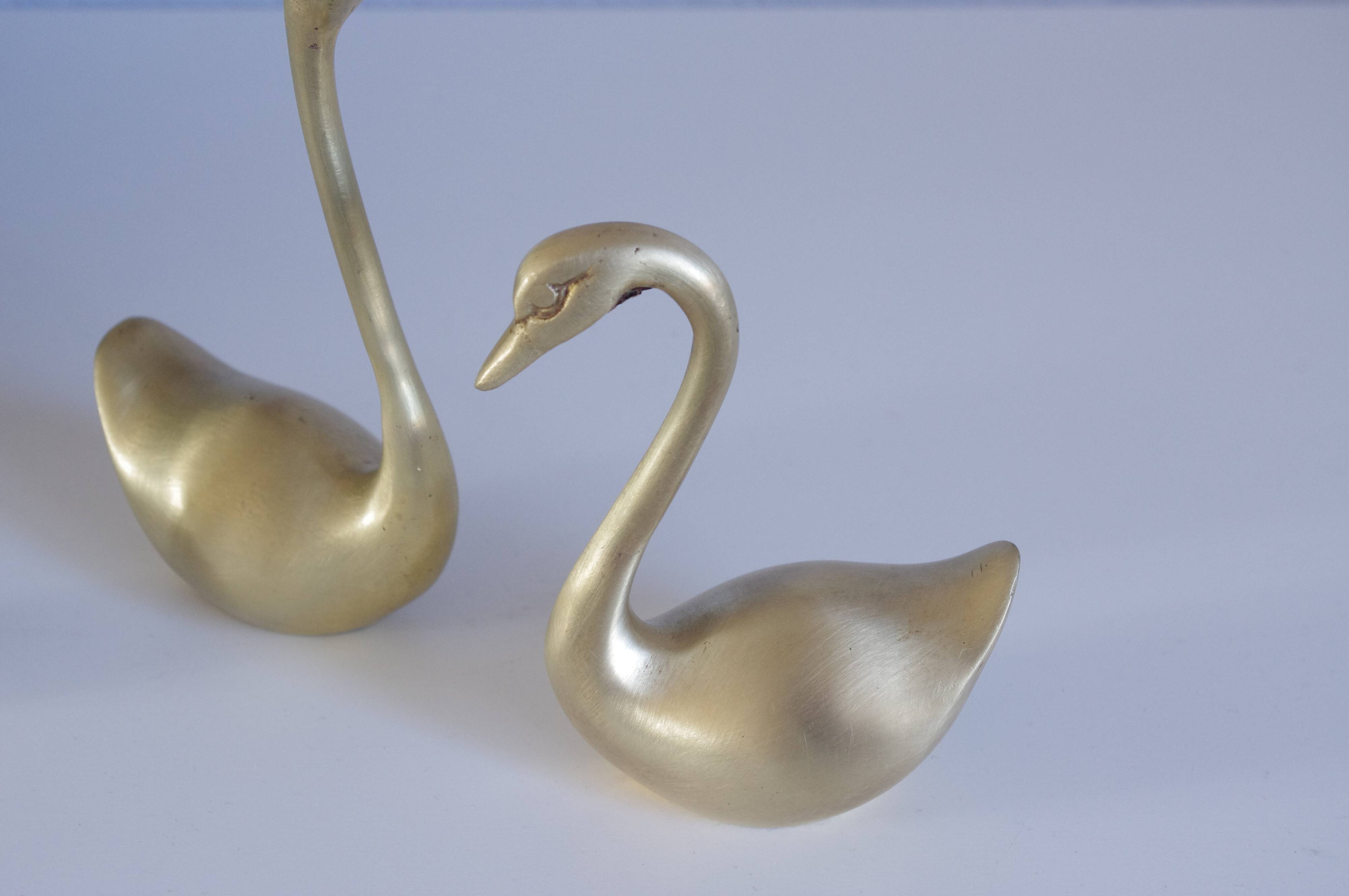Swans or ducks brass