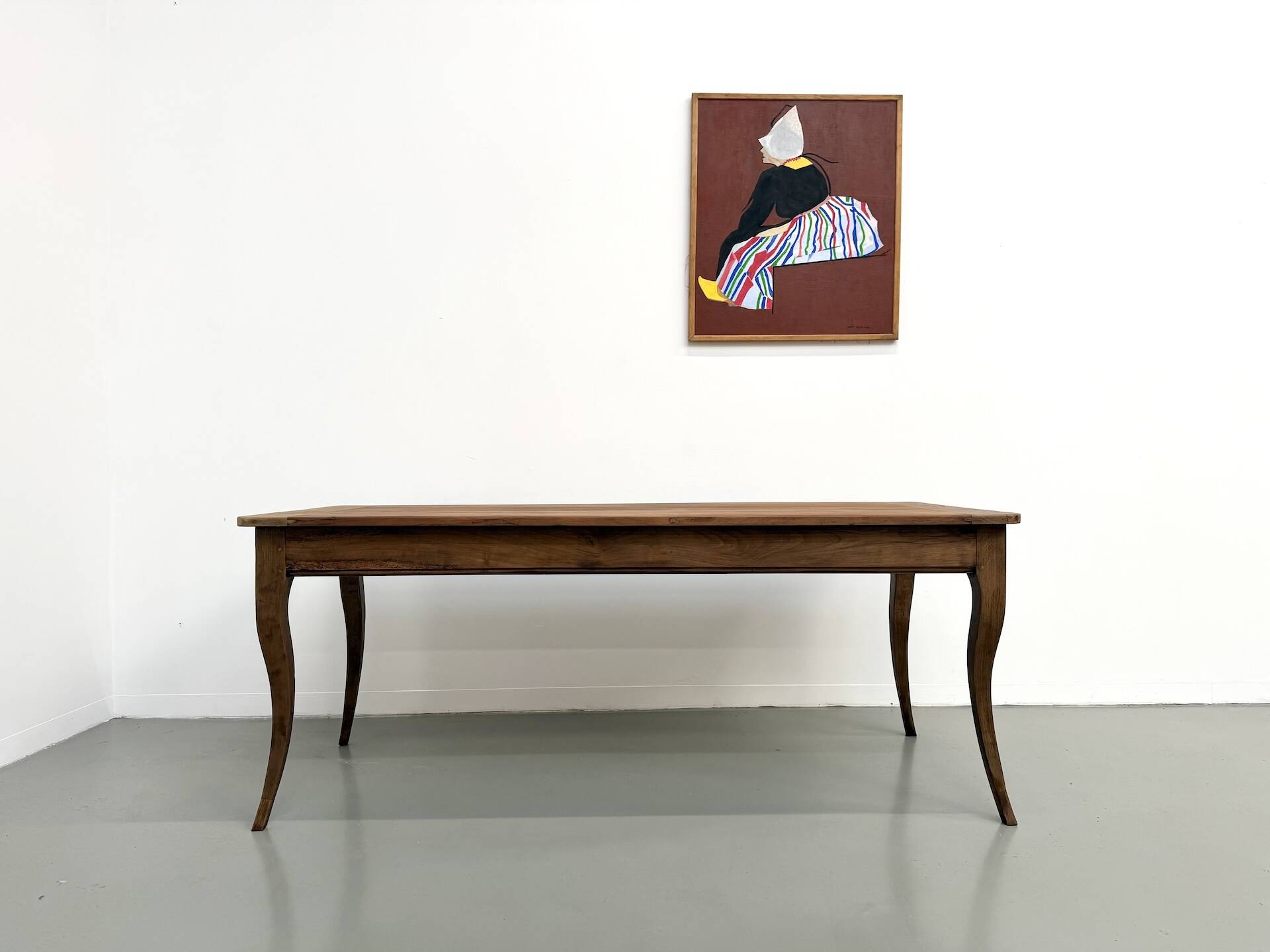 Farm table in solid cherry — Saber legs, Circa 1880