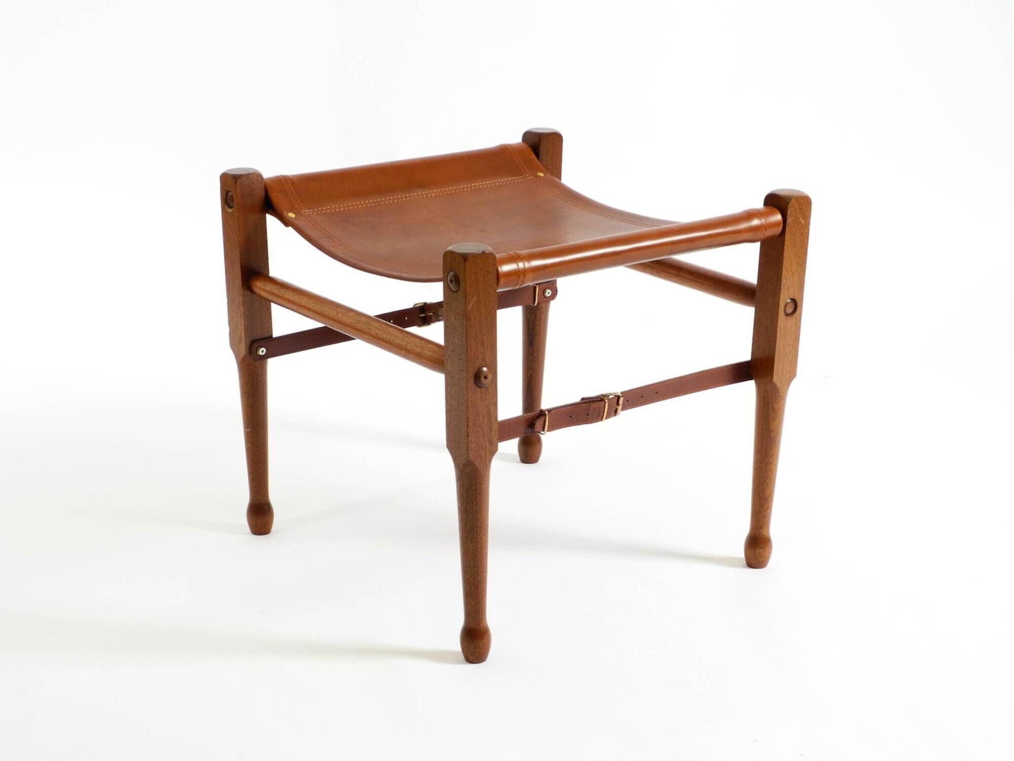 Rare 1990s safari stool with a teak frame and a seat made of brown saddle l