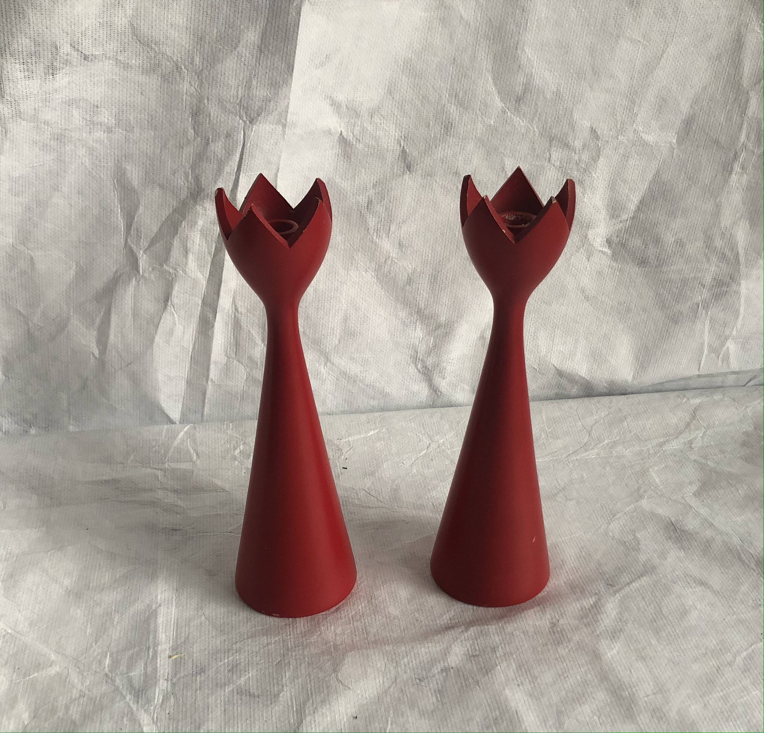 pair of Scandinavian painted wooden candle holders, minimalist atmosphere, free form