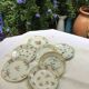 7 small plates in fine Limoges porcelain